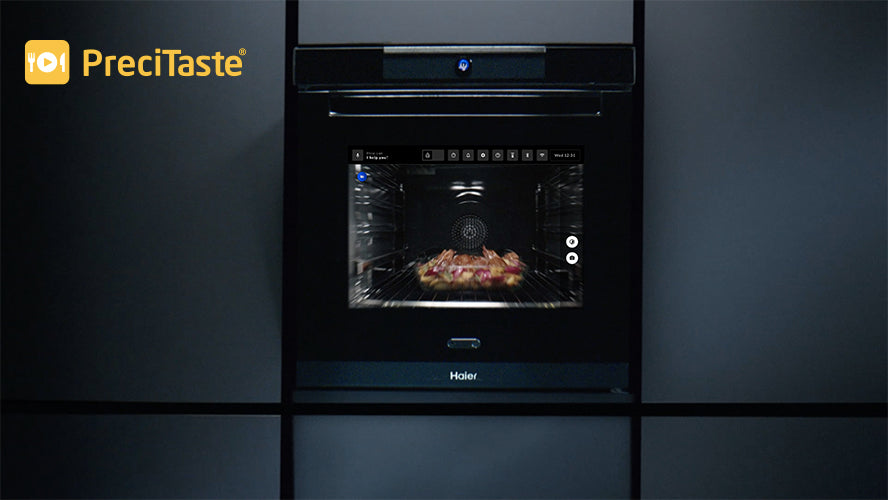 Funzione Preci Taste per i forni Haier Chef@Home elettrici. Si tratta di una fotocamera integrata e assistita dall’intelligenza artificiale rileva il tipo di cibo che stai preparando nel tuo forno elettrico, imposta automaticamente il ciclo di cottura perfetto, regola le impostazioni durante il processo e ti invia una notifica quando il cibo è pronto.