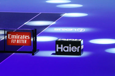 Blocco sponsor Haier su campo da tennis