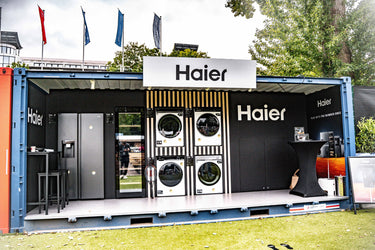 Show room Haier con lavatrice e asciugatrice